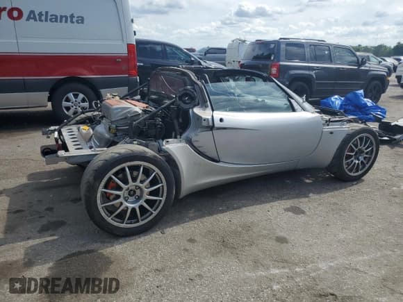 ✅ 2005 Lotus Elise • VIN: SCCPC111X5HL32084 • Lot: 54543185. Wystawiony na Copart z przebiegiem Nie podano. Bezpłatny archiwum sprzedaży aukcyjnych z USA i szczegółowy raport historii pojazdu na DreamBid. Zdjęcie 3.