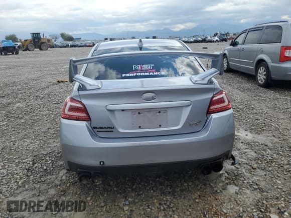 ✅ 2020 Subaru WRX STI • VIN: JF1VA2E65L9803033 • Lot: 70590655. Listed on Copart with 56,802 mi. Free auction sales archive from the USA and detailed vehicle history report at DreamBid. Image 6.