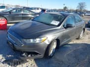 ✅ 2018 Ford Fusion SE • VIN: 3FA6P0LU6JR102379 • Лот: 43800712. Опубликован ранее на IAAI с пробегом 208 530 миль. Бесплатный доступ к архиву аукционных продаж из США и подробный отчёт об истории автомобиля на DreamBid. Изображение 2.