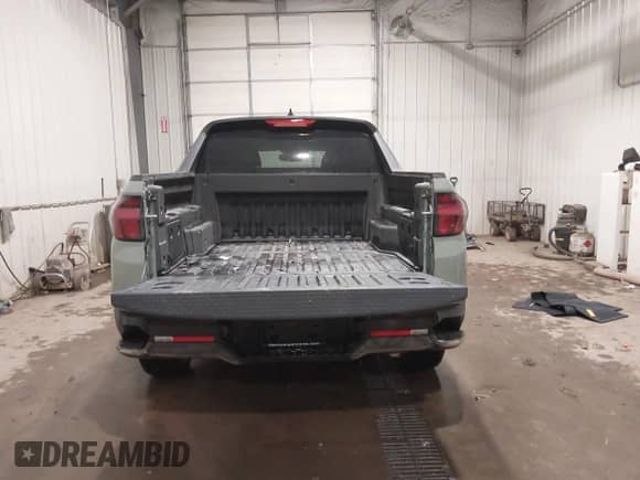 2024 Hyundai Santa Cruz SE with VIN 5NTJADDE7RH108941, listed as a IAAI auction lot 40990254 with 7,461 mi miles and . Bid and sale history available at DreamBid. Image 17.