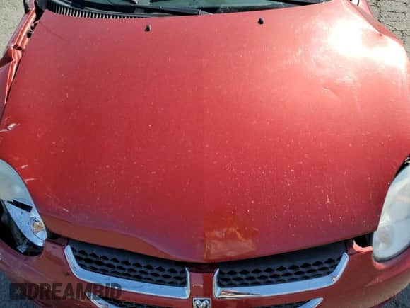 2004 Dodge Neon SXT z VIN 1B3ES56C04D611421, wystawiony jako Copart lot #59736725 z przebiegiem 131 406 mil mil oraz Szkoda całkowita • Salvage title. Historia ofert i sprzedaży dostępna na DreamBid. Obrazek 11.