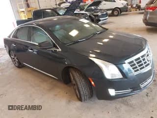 ✅ 2013 Cadillac XTS Luxury • VIN: 2G61P5S34D9173569 • Lot: 42860859. Wystawiony na IAAI z przebiegiem 111 230 mil. Bezpłatny archiwum sprzedaży aukcyjnych z USA i szczegółowy raport historii pojazdu na DreamBid. Zdjęcie 1.