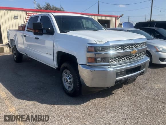 ✅ 2019 Chevrolet Silverado 2500HD Work Truck • VIN: 1GC1CREG4KF222935 • Лот: 43855560. Опубликован ранее на IAAI с пробегом 220 407 миль. Бесплатный доступ к архиву аукционных продаж из США и подробный отчёт об истории автомобиля на DreamBid. Изображение 3.
