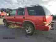 2000 Chevrolet Blazer LT z VIN 1GNCS13W0Y2279860, wystawiony jako Copart lot #85297234 z przebiegiem 192 927 mil mil oraz Szkoda całkowita • Salvage title. Historia ofert i sprzedaży dostępna na DreamBid. Obrazek 2.