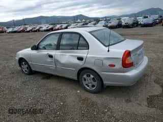 2000 Hyundai Accent z VIN KMHCG45G8YU120795, wystawiony jako Copart lot #61005175 z przebiegiem 96 515 mil mil oraz Czysty tytuł • Clean title. Historia ofert i sprzedaży dostępna na DreamBid. Obrazek 2.