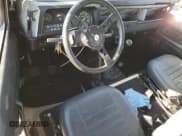 ✅ 1987 Land Rover Defender • VIN: SALLDVAB8AA292973 • Lot: 74849404. Wystawiony na Copart z przebiegiem 367 021 mil. Bezpłatny archiwum sprzedaży aukcyjnych z USA i szczegółowy raport historii pojazdu na DreamBid. Zdjęcie 8.