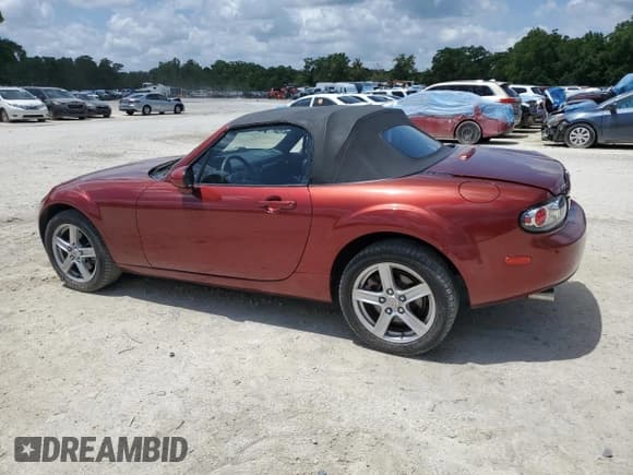 ✅ 2007 Mazda MX-5 Miata Sport • VIN: JM1NC25F570123843 • Lot: 54828665. Wystawiony na Copart z przebiegiem 91 257 mil. Bezpłatny archiwum sprzedaży aukcyjnych z USA i szczegółowy raport historii pojazdu na DreamBid. Zdjęcie 2.