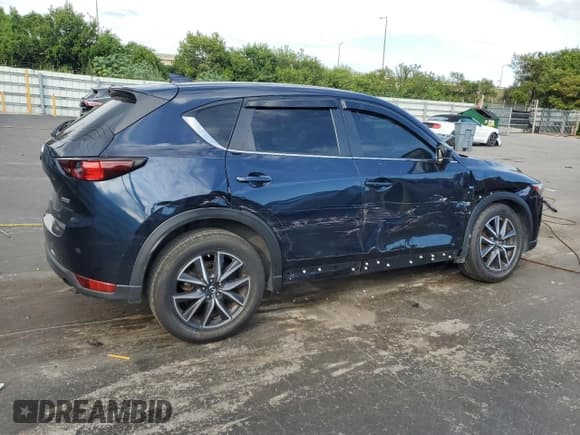 ✅ 2018 Mazda CX-5 Touring • VIN: JM3KFACM6J1448886 • Lot: 91935085. Wystawiony na Copart z przebiegiem 102 177 mil. Bezpłatny archiwum sprzedaży aukcyjnych z USA i szczegółowy raport historii pojazdu na DreamBid. Zdjęcie 3.