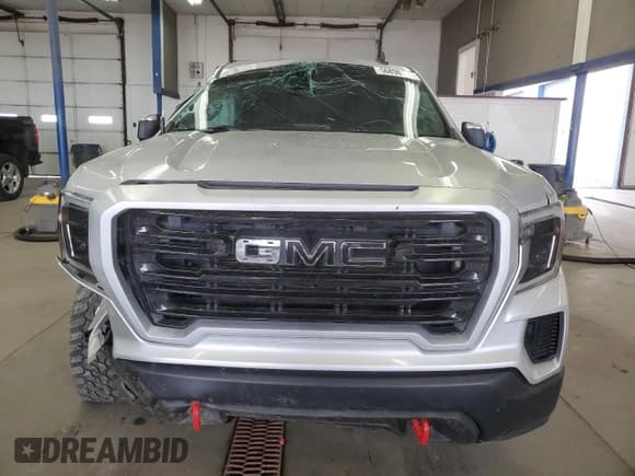 ✅ 2021 GMC Sierra 1500 SLE • VIN: 1GTR9BED8MZ236210 • Лот: 56898185. Опубликован ранее на Copart с пробегом 128 697 миль. Бесплатный доступ к архиву аукционных продаж из США и подробный отчёт об истории автомобиля на DreamBid. Изображение 5.