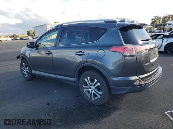 ✅ 2017 Toyota RAV4 LE • VIN: JTMZFREV1HJ711291 • Lot: 93116175. Listed on Copart with 85,242 mi. Free auction sales archive from the USA and detailed vehicle history report at DreamBid. Image 2.