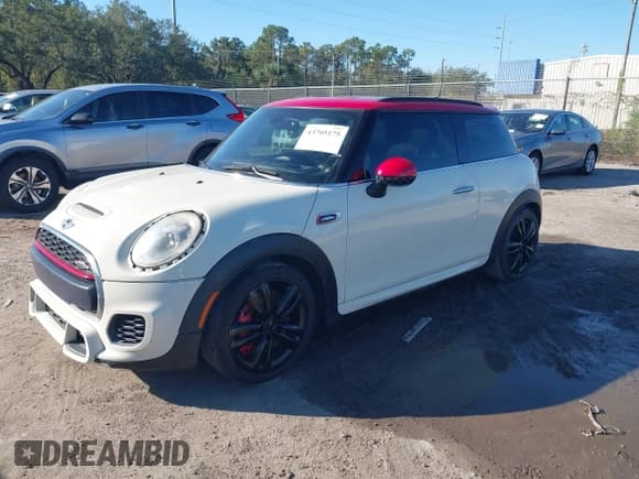 ✅ 2016 MINI Hardtop John Cooper Works • VIN: WMWXM9C52GT997913 • Lot: 43705175. Listed on IAAI with 148,898 mi. Free auction sales archive from the USA and detailed vehicle history report at DreamBid. Image 2.