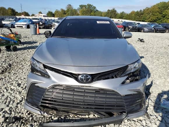 2023 Toyota Camry LE with VIN 4T1C11AK1PU121943, listed as a Copart auction lot 82264925 with 56,723 mi miles and Salvage title. Bid and sale history available at DreamBid. Image 5.