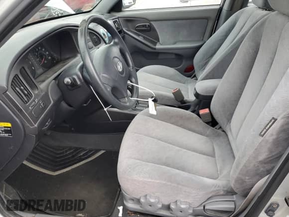 2004 Hyundai Elantra GLS z VIN KMHDN46D34U885437, wystawiony jako Copart lot #78289994 z przebiegiem 140 182 mil mil oraz Szkoda całkowita • Salvage title. Historia ofert i sprzedaży dostępna na DreamBid. Obrazek 7.