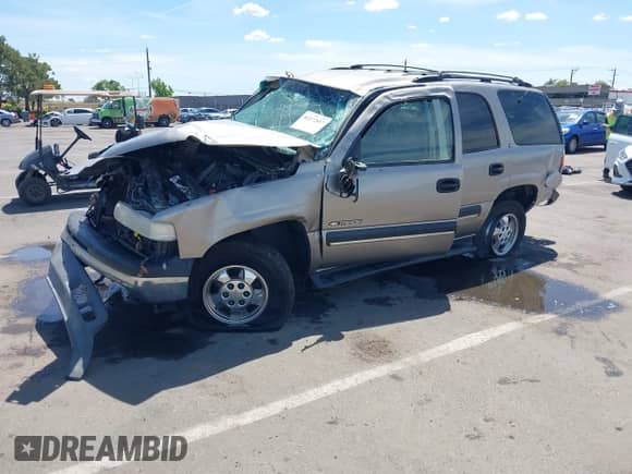 2001 Chevrolet Tahoe LT z VIN 1GNEK13T81R122136, wystawiony jako IAAI lot #42272857 z przebiegiem 216 060 mil mil oraz . Historia ofert i sprzedaży dostępna na DreamBid. Obrazek 2.