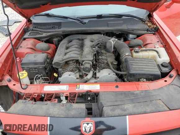 2010 Dodge Challenger SE z VIN 2B3CJ4DV5AH179738, wystawiony jako Copart lot #64823684 z przebiegiem 109 389 mil mil oraz Szkoda całkowita • Salvage title. Historia ofert i sprzedaży dostępna na DreamBid. Obrazek 11.