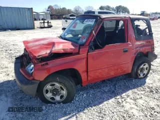 ✅ 1998 Chevrolet Tracker • VIN: 2CNBE1865W6905161 • Лот: 45019735. Опубликован ранее на Copart с пробегом 142 991 миль. Бесплатный доступ к архиву аукционных продаж из США и подробный отчёт об истории автомобиля на DreamBid. Изображение 1.