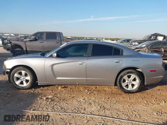 ✅ 2013 Dodge Charger SE • VIN: 2C3CDXBG6DH701961 • Lot: 43355152. Listed on IAAI with 113,746 mi. Free auction sales archive from the USA and detailed vehicle history report at DreamBid. Image 15.