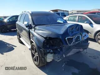 ✅ 2013 Volvo XC90 R-Design • VIN: YV4952CF7D1658075 • Lot: 43568478. Listed on IAAI with 158,967 mi. Free auction sales archive from the USA and detailed vehicle history report at DreamBid. Image 1.
