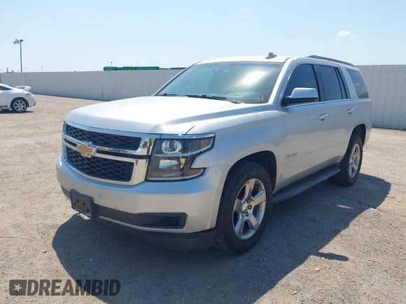 2017 Chevrolet Tahoe LT with VIN 1GNSCBKC9HR128335, listed as a IAAI auction lot 43198481 with 151,218 mi miles and . Bid and sale history available at DreamBid. Image 14.