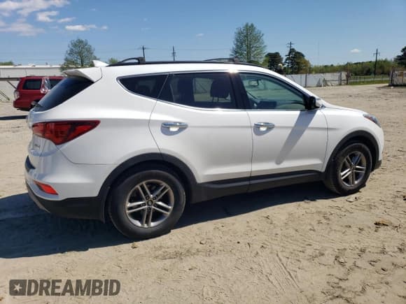 ✅ 2018 Hyundai Santa Fe 2.4L • VIN: 5NMZU3LB0JH060954 • Лот: 51750544. Опубликован ранее на Copart с пробегом 123 970 миль. Бесплатный доступ к архиву аукционных продаж из США и подробный отчёт об истории автомобиля на DreamBid. Изображение 3.