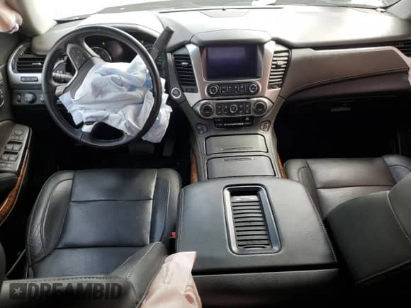 2020 Chevrolet Tahoe Premier with VIN 1GNSKCKC7LR125399, listed as a Copart auction lot 54702635 with 134,684 mi miles and Salvage title. Bid and sale history available at DreamBid. Image 8.