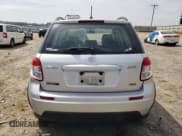 ✅ 2010 Suzuki SX4 • VIN: JS2YB5A30A6302105 • Lot: 54560335. Wystawiony na Copart z przebiegiem 173 220 mil. Bezpłatny archiwum sprzedaży aukcyjnych z USA i szczegółowy raport historii pojazdu na DreamBid. Zdjęcie 6.