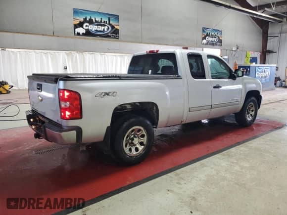 2012 Chevrolet Silverado 1500 LT with VIN 1GCRKSEA7CZ264573, listed as a Copart auction lot 79753814 with 112,695 mi miles and Salvage title. Bid and sale history available at DreamBid. Image 3.