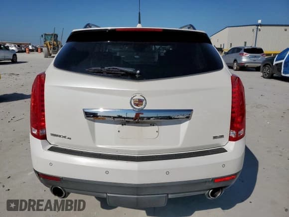 ✅ 2013 Cadillac SRX Premium Collection • VIN: 3GYFNJE37DS554987 • Lot: 84290375. Listed on Copart with 151,131 mi. Free auction sales archive from the USA and detailed vehicle history report at DreamBid. Image 6.