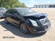 ✅ 2013 Cadillac XTS Livery • VIN: 2G61W5S32D9236977 • Lot: 43139801. Listed on IAAI with 217,135 mi. Free auction sales archive from the USA and detailed vehicle history report at DreamBid. Image 1.
