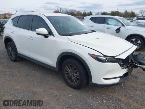 ✅ 2021 Mazda CX-5 Touring • VIN: JM3KFBCM8M0417025 • Lot: 43521796. Wystawiony na IAAI z przebiegiem 44 218 mil. Bezpłatny archiwum sprzedaży aukcyjnych z USA i szczegółowy raport historii pojazdu na DreamBid. Zdjęcie 1.