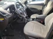 ✅ 2018 Hyundai Santa Fe 2.4L • VIN: 5NMZT3LB5JH069006 • Лот: 37106213. Опубликован ранее на Copart с пробегом 63 120 миль. Бесплатный доступ к архиву аукционных продаж из США и подробный отчёт об истории автомобиля на DreamBid. Изображение 7.