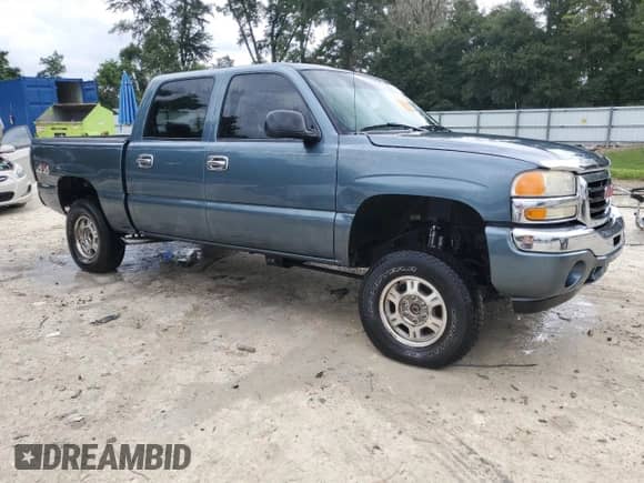 2007 GMC Sierra 1500 SL with VIN 2GTEK13V171109210, listed as a Copart auction lot 72076074 with 258,054 mi miles and Salvage title. Bid and sale history available at DreamBid. Image 4.
