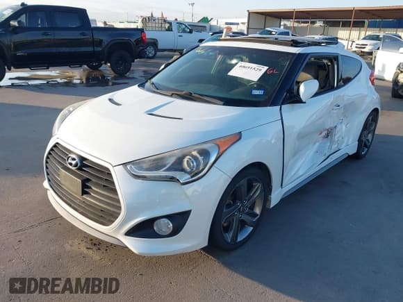✅ 2014 Hyundai Veloster Turbo • VIN: KMHTC6AE9EU201750 • Lot: 40691529. Wystawiony na IAAI z przebiegiem 87 958 mil. Bezpłatny archiwum sprzedaży aukcyjnych z USA i szczegółowy raport historii pojazdu na DreamBid. Zdjęcie 2.