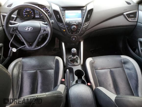 ✅ 2013 Hyundai Veloster Turbo • VIN: KMHTC6AE9DU129043 • Lot: 76062554. Wystawiony na Copart z przebiegiem 103 708 mil. Bezpłatny archiwum sprzedaży aukcyjnych z USA i szczegółowy raport historii pojazdu na DreamBid. Zdjęcie 8.