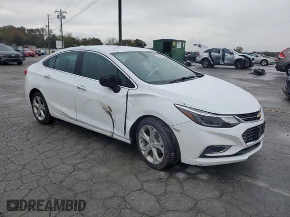 ✅ 2017 Chevrolet Cruze Premier • VIN: 1G1BF5SMXH7106424 • Lot: 90459715. Listed on Copart with 83,302 mi. Free auction sales archive from the USA and detailed vehicle history report at DreamBid. Image 4.