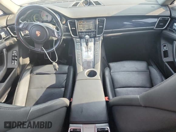 ✅ 2015 Porsche Panamera S E-Hybrid • VIN: WP0AD2A77FL040812 • Лот: 81626565. Опубликован ранее на Copart с пробегом 65 319 миль. Бесплатный доступ к архиву аукционных продаж из США и подробный отчёт об истории автомобиля на DreamBid. Изображение 8.