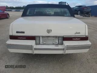 ✅ 1987 Cadillac Seville • VIN: 1G6KS518XHU812739 • Lot: 79308574. Wystawiony na Copart z przebiegiem Nie podano. Bezpłatny archiwum sprzedaży aukcyjnych z USA i szczegółowy raport historii pojazdu na DreamBid. Zdjęcie 6.