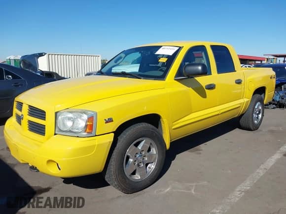 2006 Dodge Dakota SLT z VIN 1D7HW48J46S584508, wystawiony jako IAAI lot #40732421 z przebiegiem 148 957 mil mil oraz . Historia ofert i sprzedaży dostępna na DreamBid. Obrazek 2.