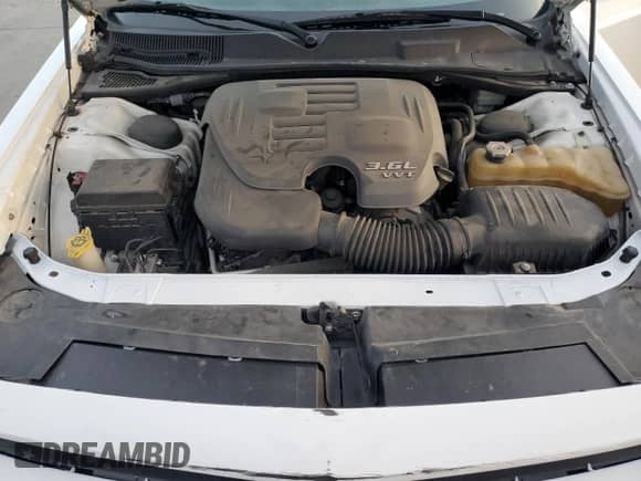 2014 Dodge Challenger SXT z VIN 2C3CDYAG0EH101106, wystawiony jako Copart lot #72629304 z przebiegiem 108 449 mil mil oraz Szkoda całkowita • Salvage title. Historia ofert i sprzedaży dostępna na DreamBid. Obrazek 11.