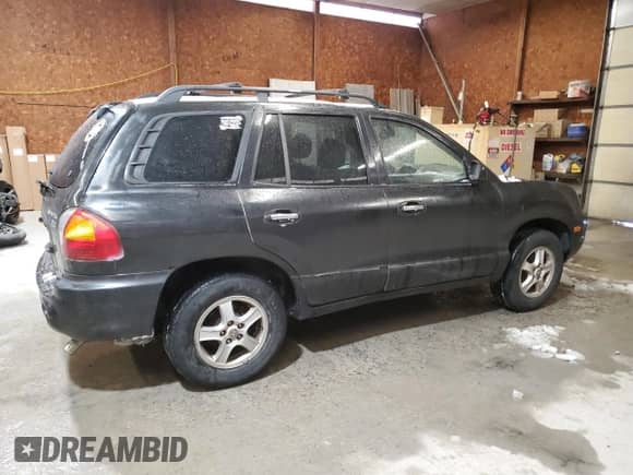 2004 Hyundai Santa Fe GLS z VIN KM8SC73E74U597688, wystawiony jako Copart lot #44570985 z przebiegiem 213 584 mil mil oraz Szkoda całkowita • Salvage title. Historia ofert i sprzedaży dostępna na DreamBid. Obrazek 3.