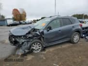 ✅ 2013 Mazda CX-5 Touring • VIN: JM3KE4CE8D0137824 • Lot: 90602845. Listed on Copart with 123,203 mi. Free auction sales archive from the USA and detailed vehicle history report at DreamBid. Image 1.