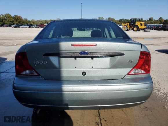 ✅ 2003 Ford Focus SE • VIN: 1FAFP34P23W104317 • Lot: 87206665. Listed on Copart with 96,949 mi. Free auction sales archive from the USA and detailed vehicle history report at DreamBid. Image 6.