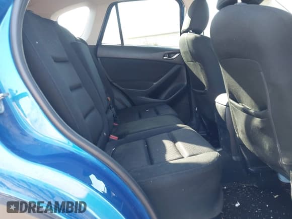 ✅ 2013 Mazda CX-5 Touring • VIN: JM3KE4CE8D0102801 • Lot: 43206563. Listed on IAAI with 149,282 mi. Free auction sales archive from the USA and detailed vehicle history report at DreamBid. Image 8.
