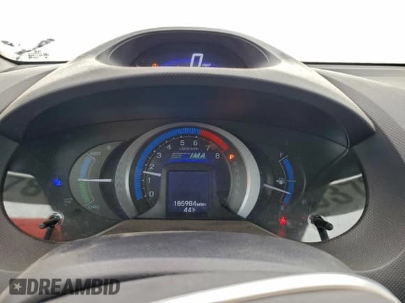 ✅ 2010 Honda Insight LX • VIN: JHMZE2H55AS003503 • Лот: 93785475. Опубликован ранее на Copart с пробегом 185 984 миль. Бесплатный доступ к архиву аукционных продаж из США и подробный отчёт об истории автомобиля на DreamBid. Изображение 9.