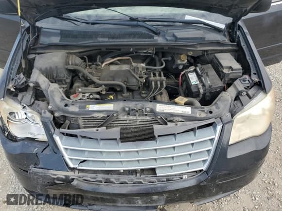 ✅ 2010 Chrysler Town & Country LX • VIN: 2A4RR2D14AR441739 • Lot: 64903955. Wystawiony na Copart z przebiegiem 153 307 mil. Bezpłatny archiwum sprzedaży aukcyjnych z USA i szczegółowy raport historii pojazdu na DreamBid. Zdjęcie 12.