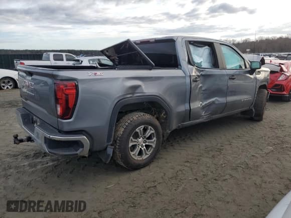 ✅ 2021 GMC Sierra 1500 • VIN: 3GTU9AEF1MG269684 • Lot: 84997854. Wystawiony na Copart z przebiegiem 98 349 mil. Bezpłatny archiwum sprzedaży aukcyjnych z USA i szczegółowy raport historii pojazdu na DreamBid. Zdjęcie 3.