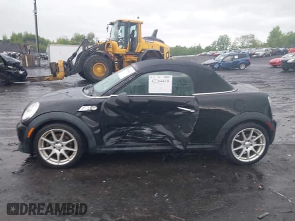 ✅ 2013 MINI Roadster S • VIN: WMWSY3C50DT566042 • Lot: 42264418. Listed on IAAI with 84,762 mi. Free auction sales archive from the USA and detailed vehicle history report at DreamBid. Image 14.