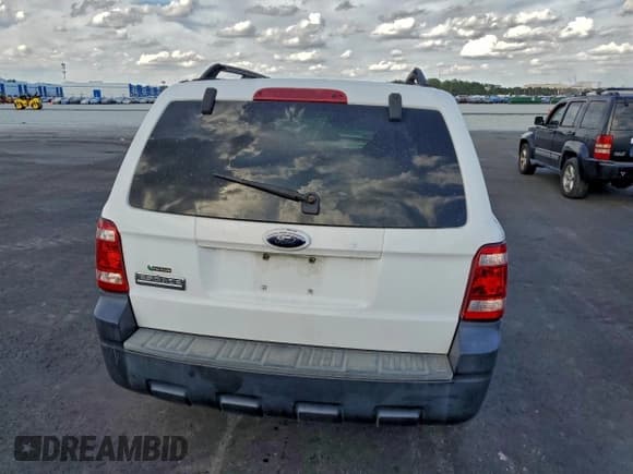 ✅ 2008 Ford Escape XLS • VIN: 1FMCU02Z38KE31604 • Лот: 94324385. Опубликован ранее на Copart с пробегом 221 494 миль. Бесплатный доступ к архиву аукционных продаж из США и подробный отчёт об истории автомобиля на DreamBid. Изображение 6.