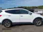 2016 Hyundai Santa Fe z VIN 5XYZU3LB5GG352375, wystawiony jako IAAI lot #43275296 z przebiegiem 161 689 mil mil oraz . Historia ofert i sprzedaży dostępna na DreamBid. Obrazek 13.