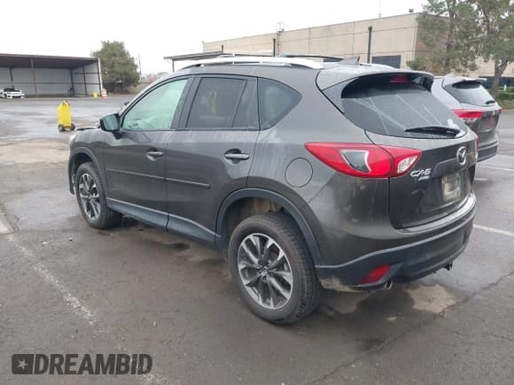 ✅ 2016 Mazda CX-5 Grand Touring • VIN: JM3KE4DY2G0763608 • Lot: 43864275. Wystawiony na IAAI z przebiegiem 95 452 mil. Bezpłatny archiwum sprzedaży aukcyjnych z USA i szczegółowy raport historii pojazdu na DreamBid. Zdjęcie 3.